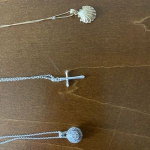 Three 20 inch necklaces. Two sterling silver, one 10k gold.